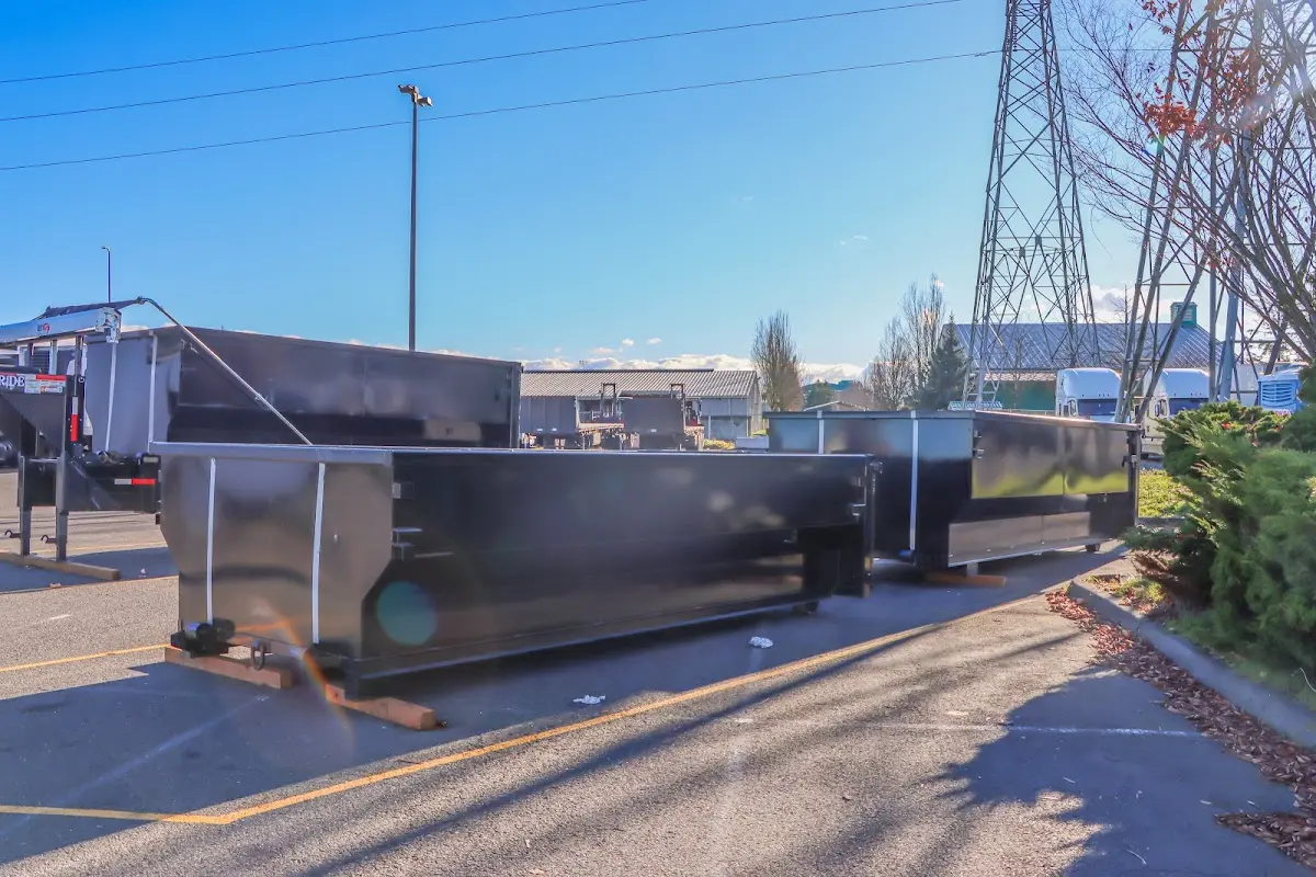 Roll-off dumpster ready for waste disposal at job site for Construction Dumpster Rental in Triangle